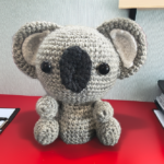 Crochet Koala on Red Desk